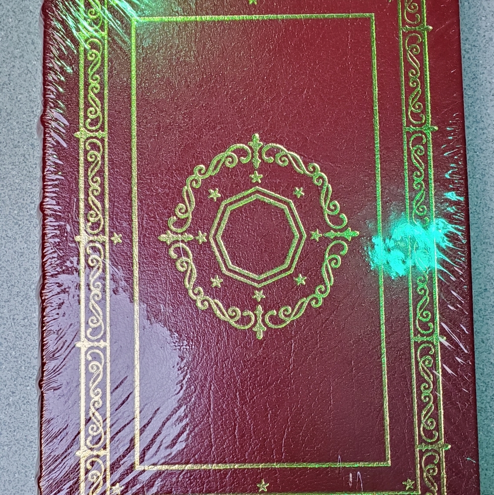 Leather bound book with gold pages
